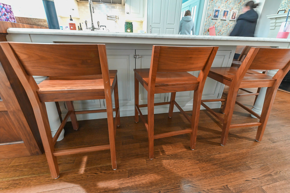 Traditional White Kitchen with Island, Marble Countertops and La Cornue Range with Matching Hood