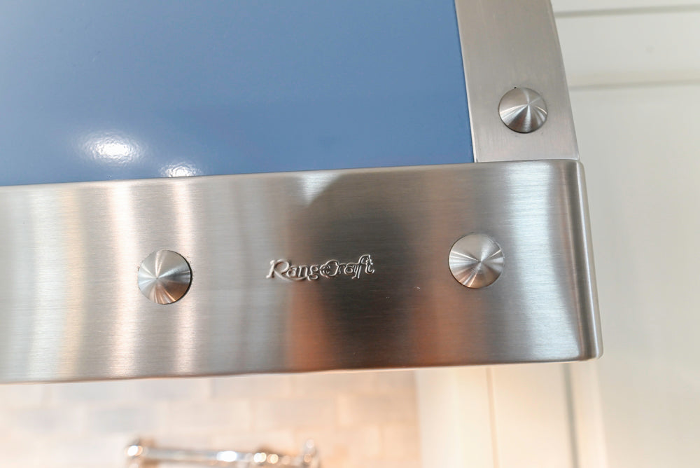 Canterbury Traditional White Kitchen with Island, Marble Countertops and La Cornue Range with Matching Hood