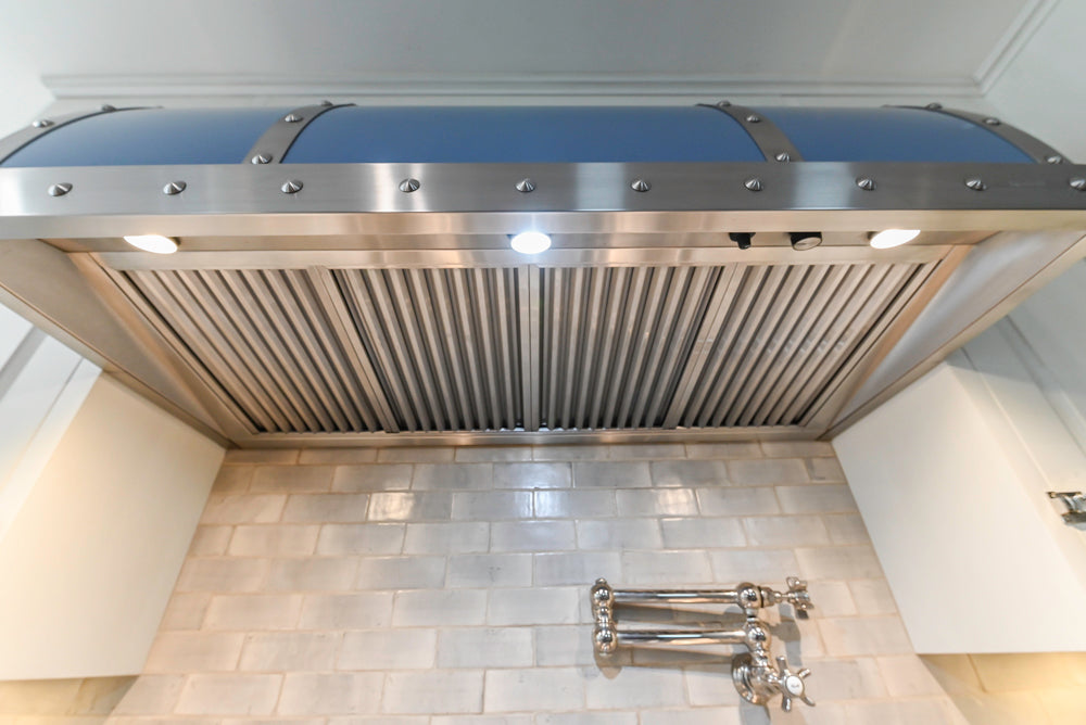 Canterbury Traditional White Kitchen with Island, Marble Countertops and La Cornue Range with Matching Hood