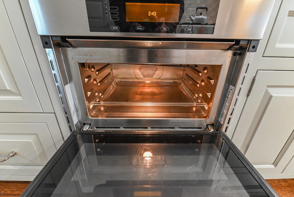 Canterbury Traditional White Kitchen with Island, Marble Countertops and La Cornue Range with Matching Hood