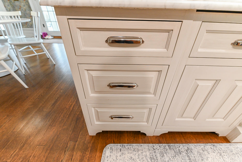 Canterbury Traditional White Kitchen with Island, Marble Countertops and La Cornue Range with Matching Hood
