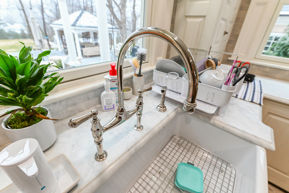Canterbury Traditional White Kitchen with Island, Marble Countertops and La Cornue Range with Matching Hood