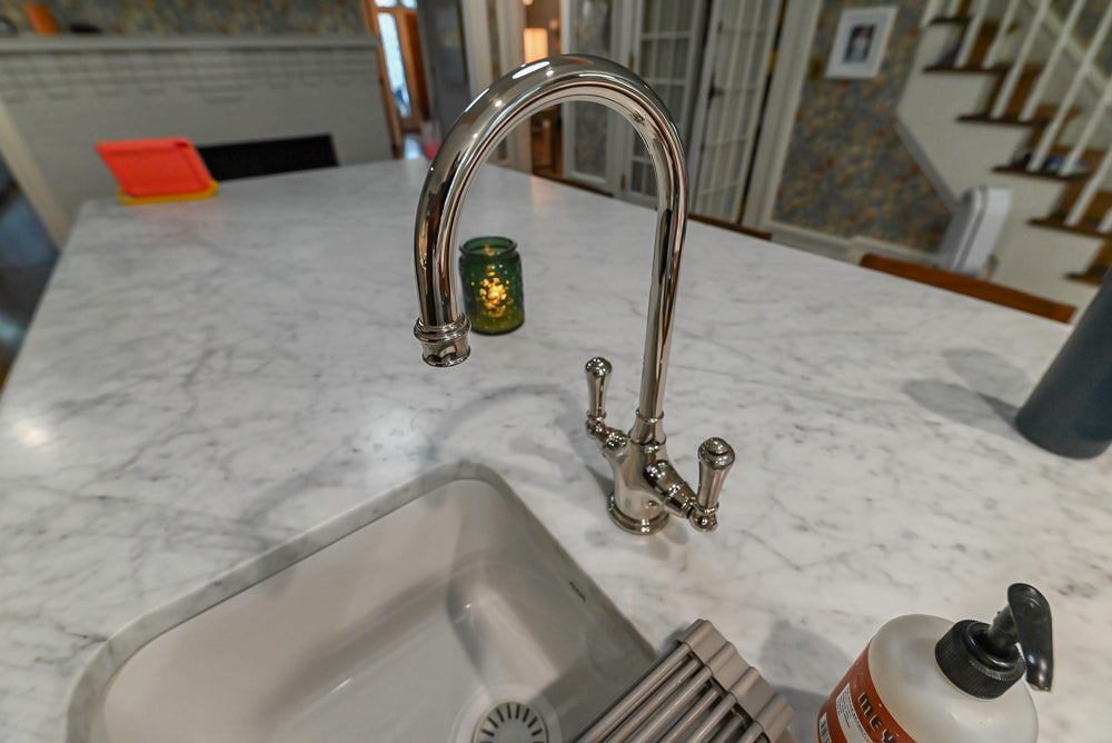 Canterbury Traditional White Kitchen with Island, Marble Countertops and La Cornue Range with Matching Hood