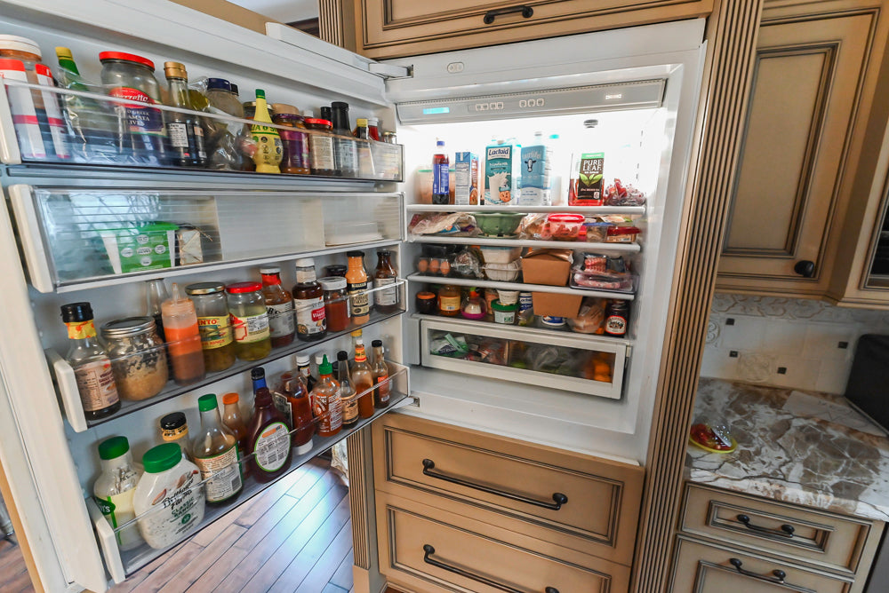 Traditional Creamy Brown Kitchen with Island, Marble Countertops and Appliances