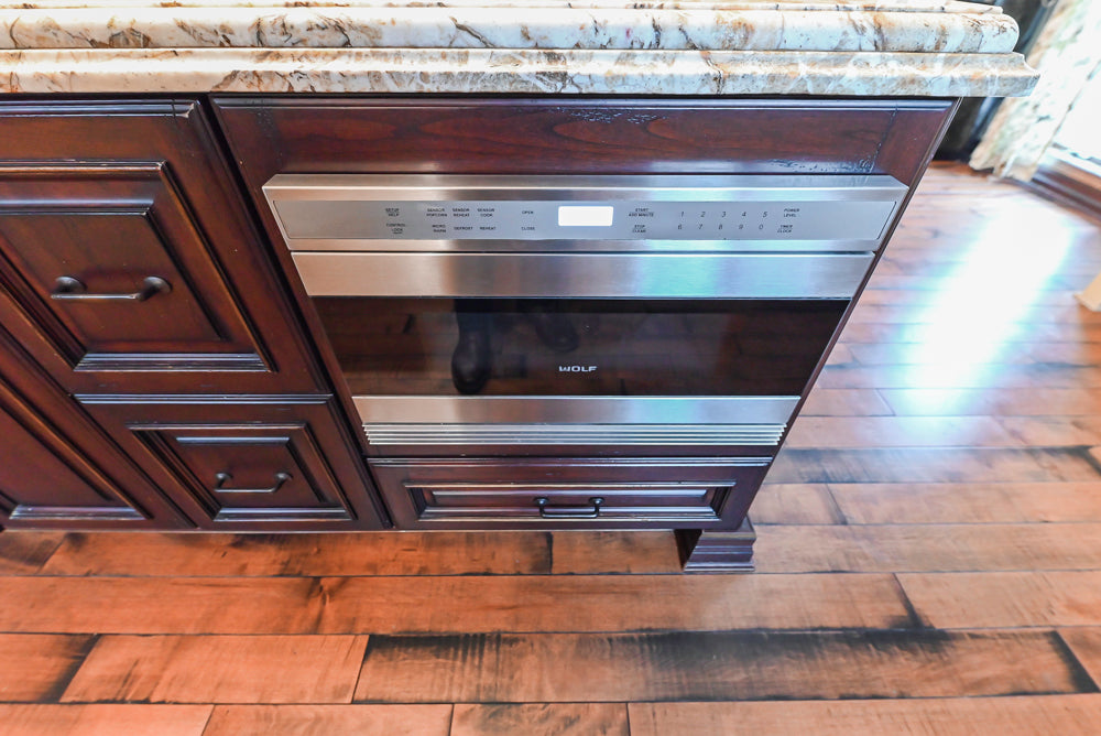 Traditional Creamy Brown Kitchen with Island, Marble Countertops and Appliances