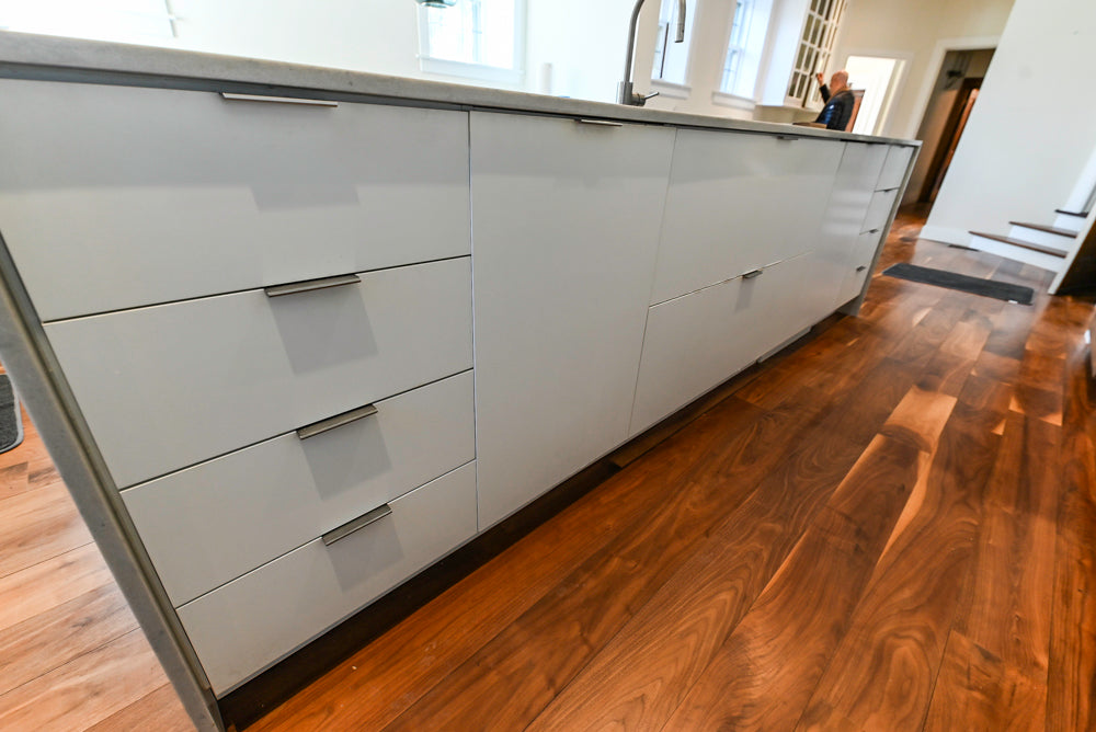 Modern Matte White Kitchen with Waterfall Island, Quartz Countertops & Miele Appliances
