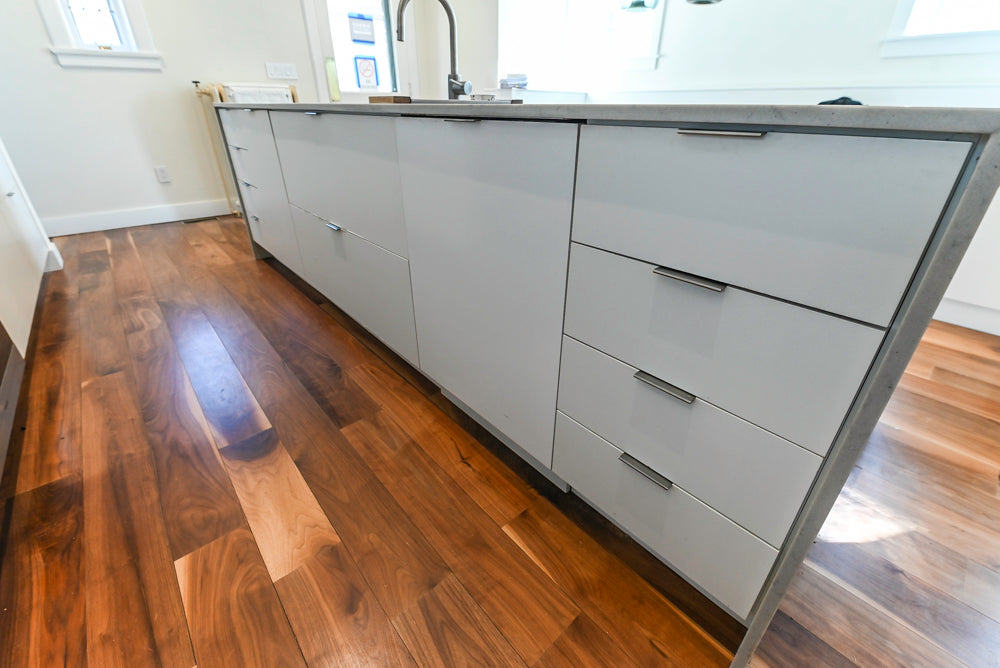 Modern Matte White Kitchen with Waterfall Island, Quartz Countertops & Miele Appliances