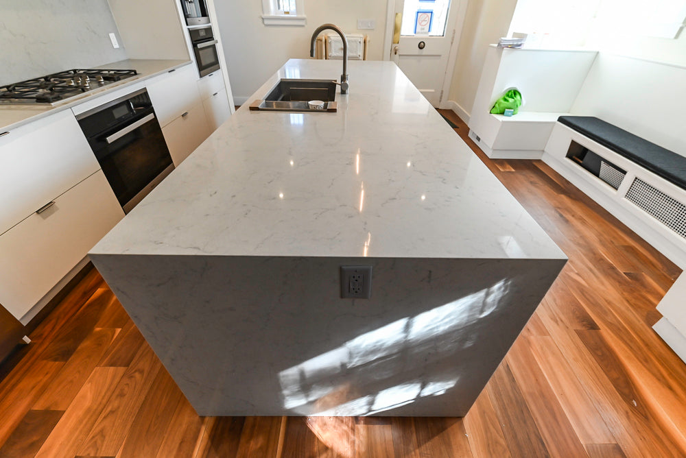 Modern Matte White Kitchen with Waterfall Island, Quartz Countertops & Miele Appliances