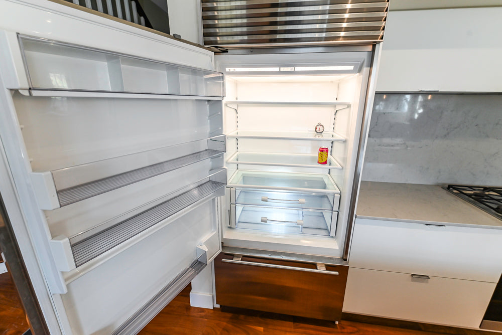 Modern Matte White Kitchen with Waterfall Island, Quartz Countertops & Miele Appliances