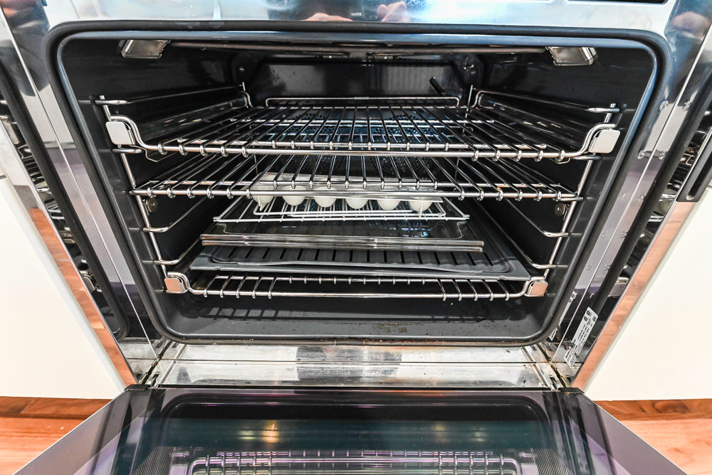 Modern Matte White Kitchen with Waterfall Island, Quartz Countertops & Miele Appliances