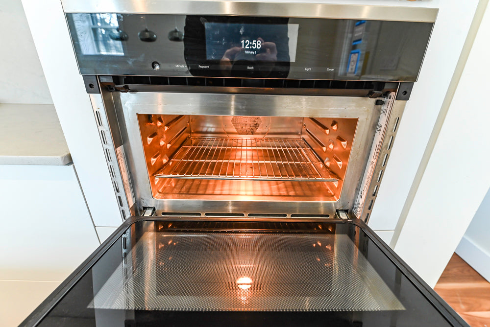 Modern Matte White Kitchen with Waterfall Island, Quartz Countertops & Miele Appliances