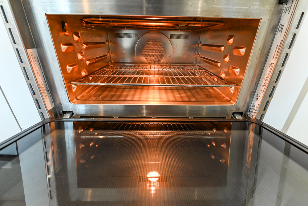 Modern Matte White Kitchen with Waterfall Island, Quartz Countertops & Miele Appliances