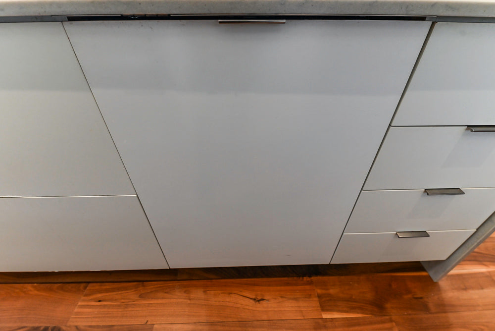 Modern Matte White Kitchen with Waterfall Island, Quartz Countertops & Miele Appliances