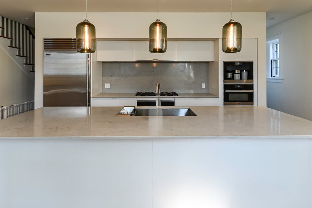 Modern Matte White Kitchen with Waterfall Island, Quartz Countertops & Miele Appliances