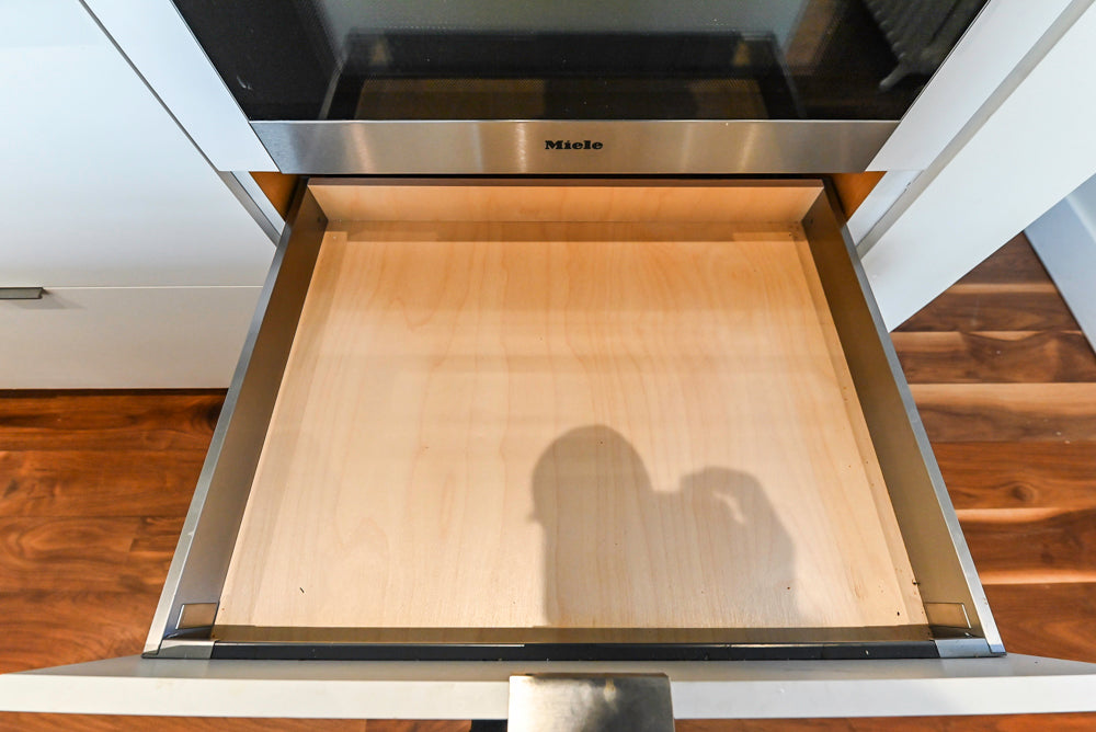 Modern Matte White Kitchen with Waterfall Island, Quartz Countertops & Miele Appliances