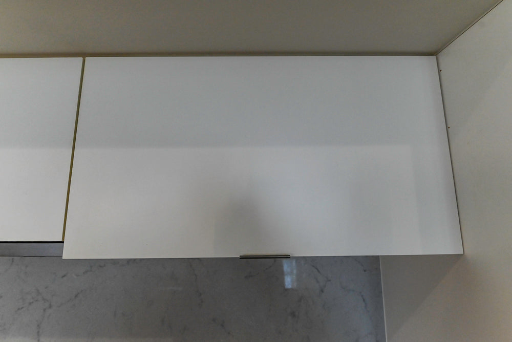 Modern Matte White Kitchen with Waterfall Island, Quartz Countertops & Miele Appliances