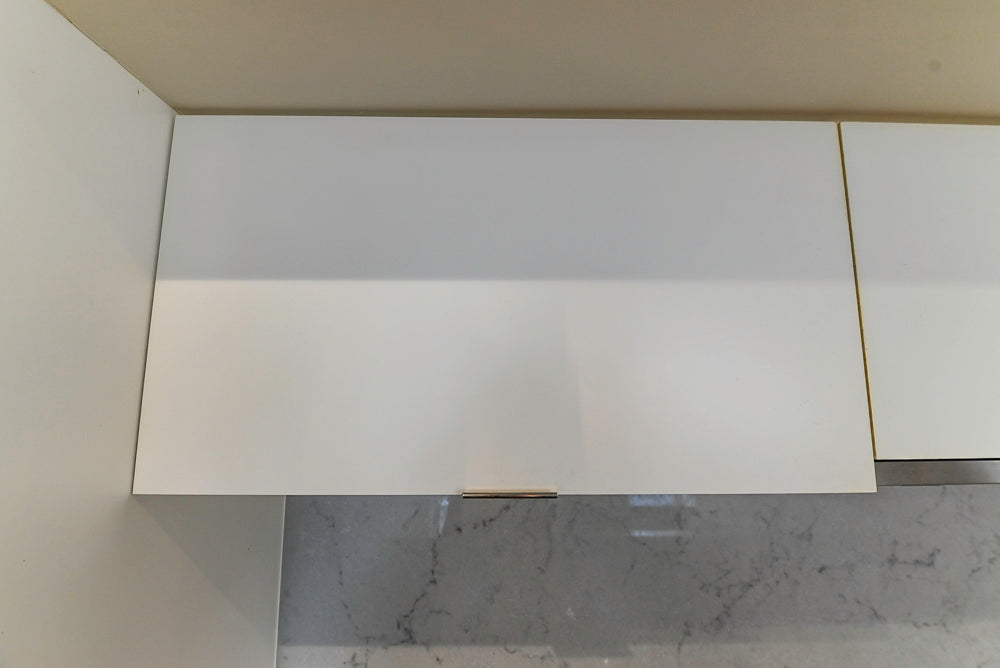 Modern Matte White Kitchen with Waterfall Island, Quartz Countertops & Miele Appliances