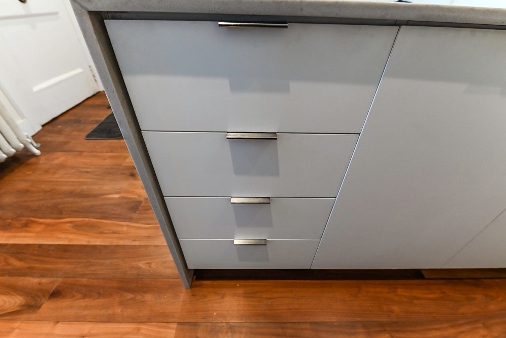 Modern Matte White Kitchen with Waterfall Island, Quartz Countertops & Miele Appliances