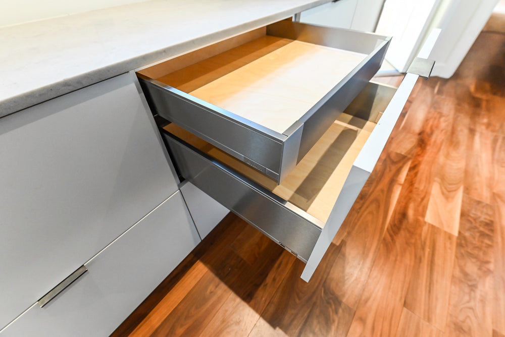 Modern Matte White Kitchen with Waterfall Island, Quartz Countertops & Miele Appliances