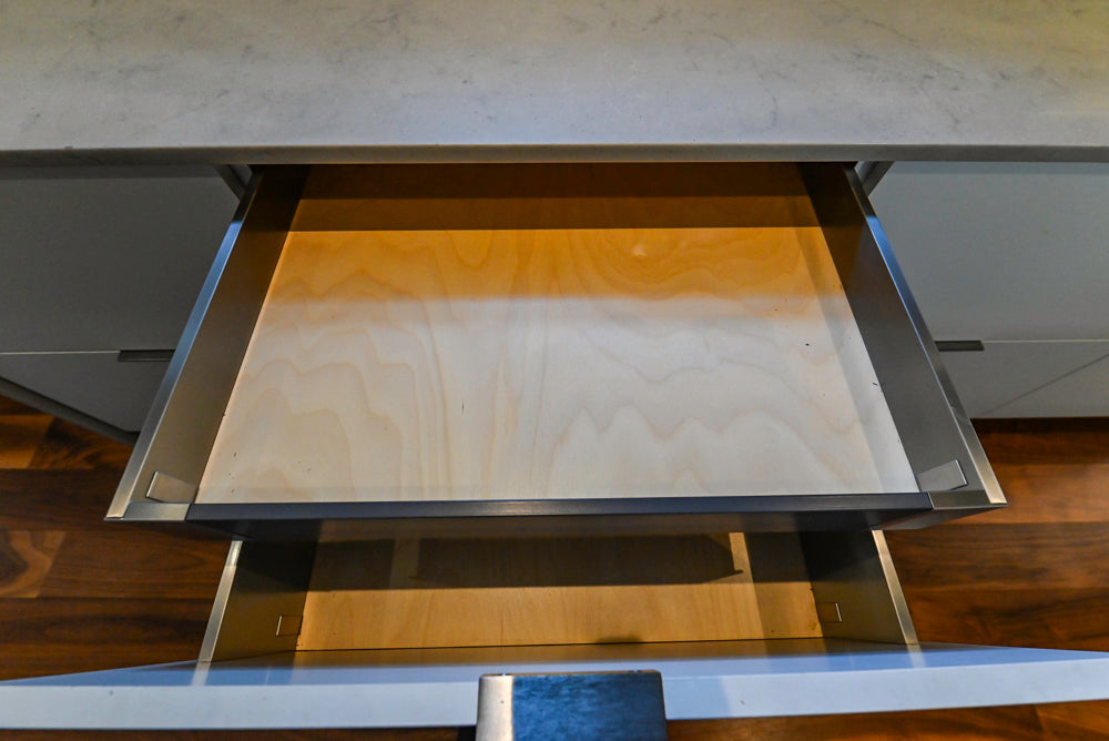 Modern Matte White Kitchen with Waterfall Island, Quartz Countertops & Miele Appliances