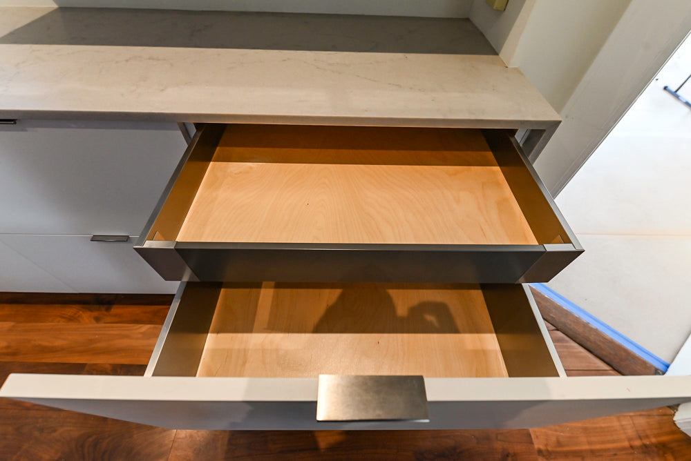 Modern Matte White Kitchen with Waterfall Island, Quartz Countertops & Miele Appliances