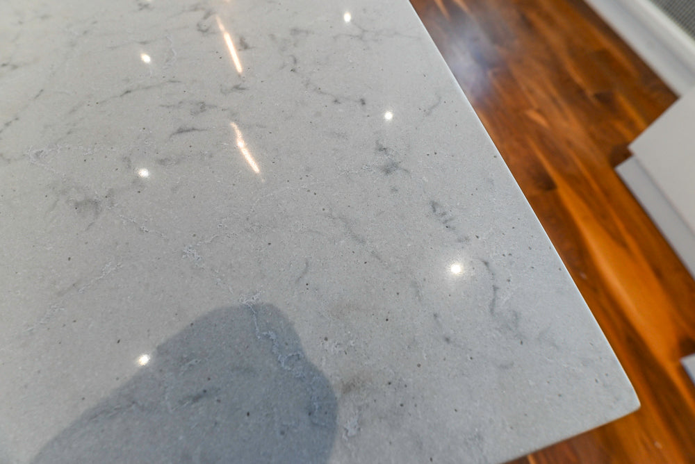 Modern Matte White Kitchen with Waterfall Island, Quartz Countertops & Miele Appliances