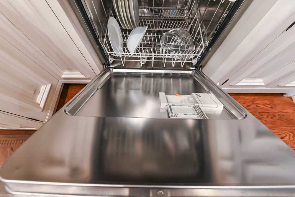 Quakermaid Traditional White Kitchen with Marble Countertops and Luxe Appliances