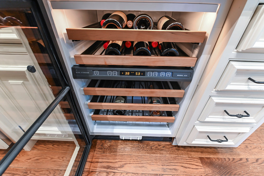 Quakermaid Traditional White Kitchen with Marble Countertops and Luxe Appliances