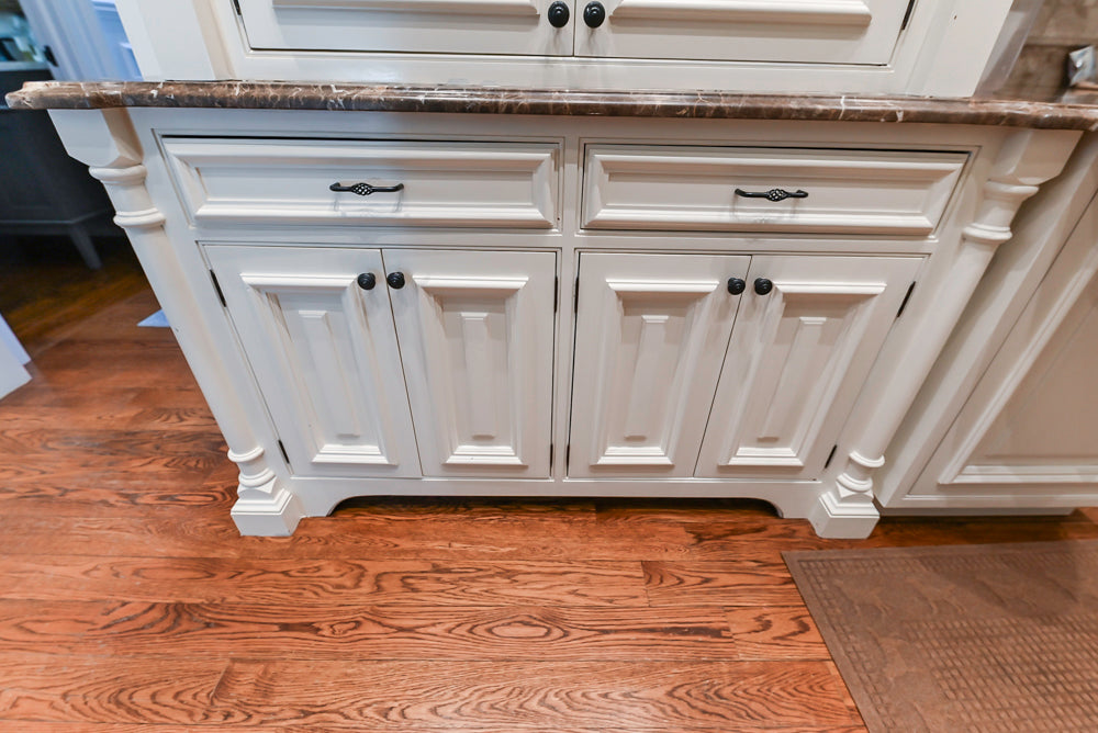 Quakermaid Traditional White Kitchen with Marble Countertops and Luxe Appliances