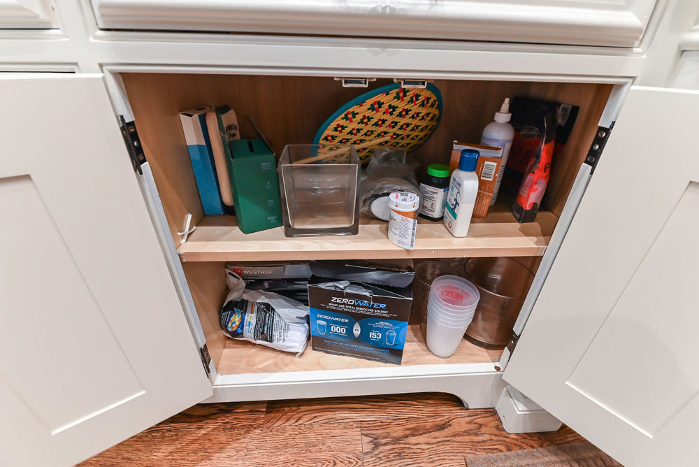 Quakermaid Traditional White Kitchen with Marble Countertops and Luxe Appliances