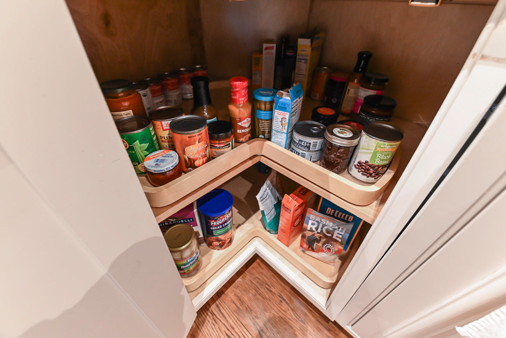 Quakermaid Traditional White Kitchen with Marble Countertops and Luxe Appliances