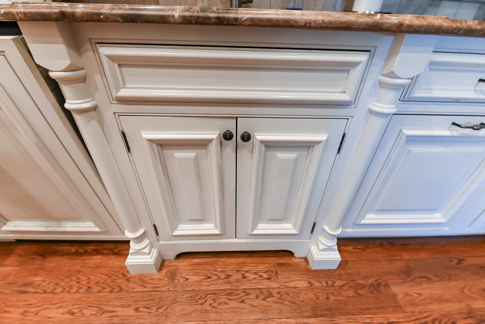 Quakermaid Traditional White Kitchen with Marble Countertops and Luxe Appliances
