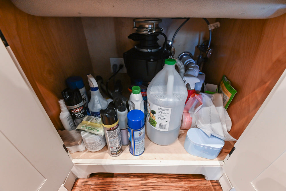 Quakermaid Traditional White Kitchen with Marble Countertops and Luxe Appliances
