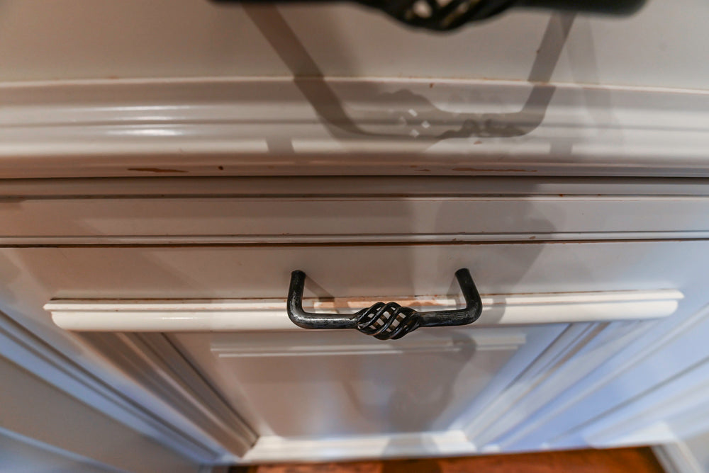 Quakermaid Traditional White Kitchen with Marble Countertops and Luxe Appliances