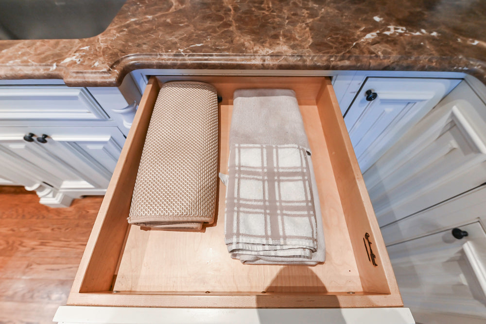 Quakermaid Traditional White Kitchen with Marble Countertops and Luxe Appliances