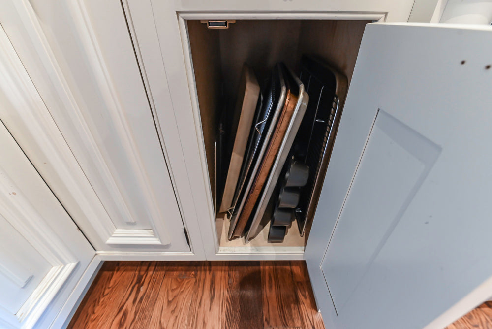 Quakermaid Traditional White Kitchen with Marble Countertops and Luxe Appliances