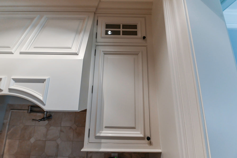 Quakermaid Traditional White Kitchen with Marble Countertops and Luxe Appliances