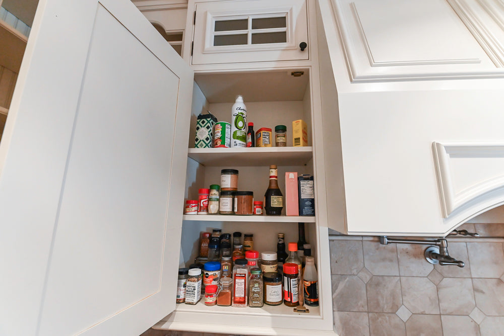 Quakermaid Traditional White Kitchen with Marble Countertops and Luxe Appliances
