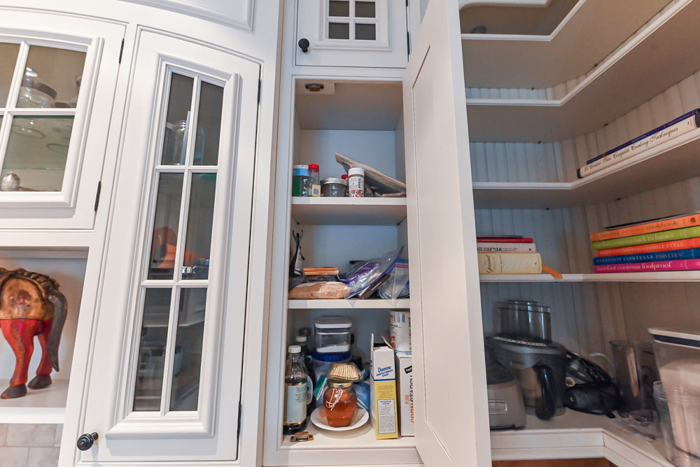 Quakermaid Traditional White Kitchen with Marble Countertops and Luxe Appliances