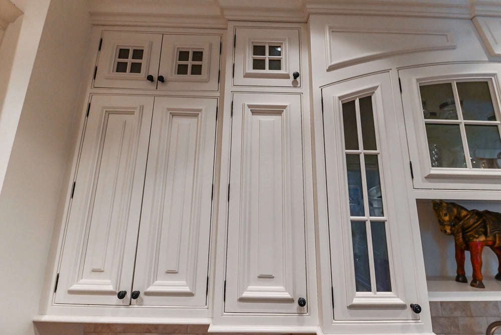 Quakermaid Traditional White Kitchen with Marble Countertops and Luxe Appliances