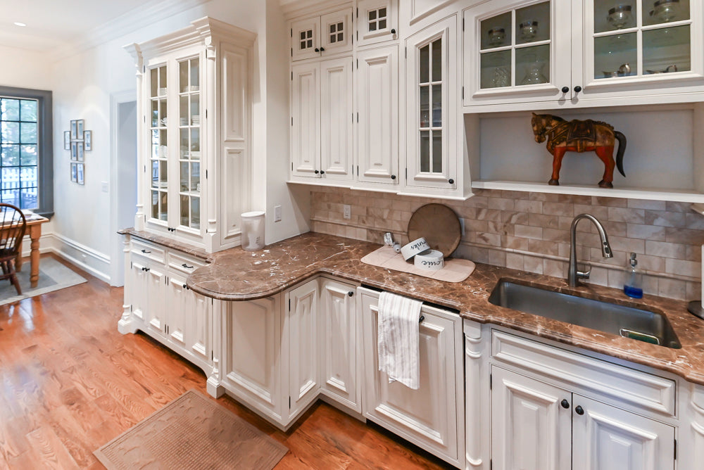 Quakermaid Traditional White Kitchen with Marble Countertops and Luxe Appliances