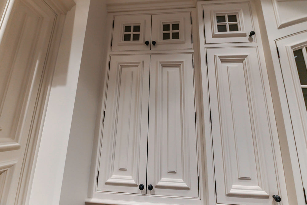 Quakermaid Traditional White Kitchen with Marble Countertops and Luxe Appliances