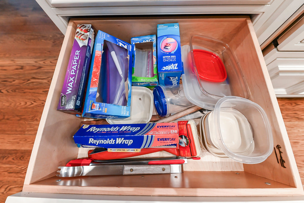 Quakermaid Traditional White Kitchen with Marble Countertops and Luxe Appliances