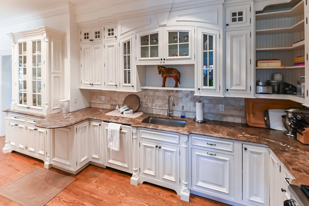 Quakermaid Traditional White Kitchen with Marble Countertops and Luxe Appliances