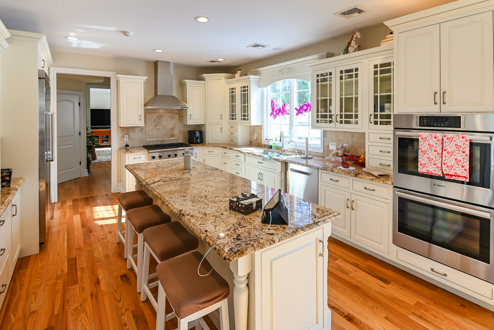 Traditional Light Cream Kitchen with Island, Granite Countertops and Appliances