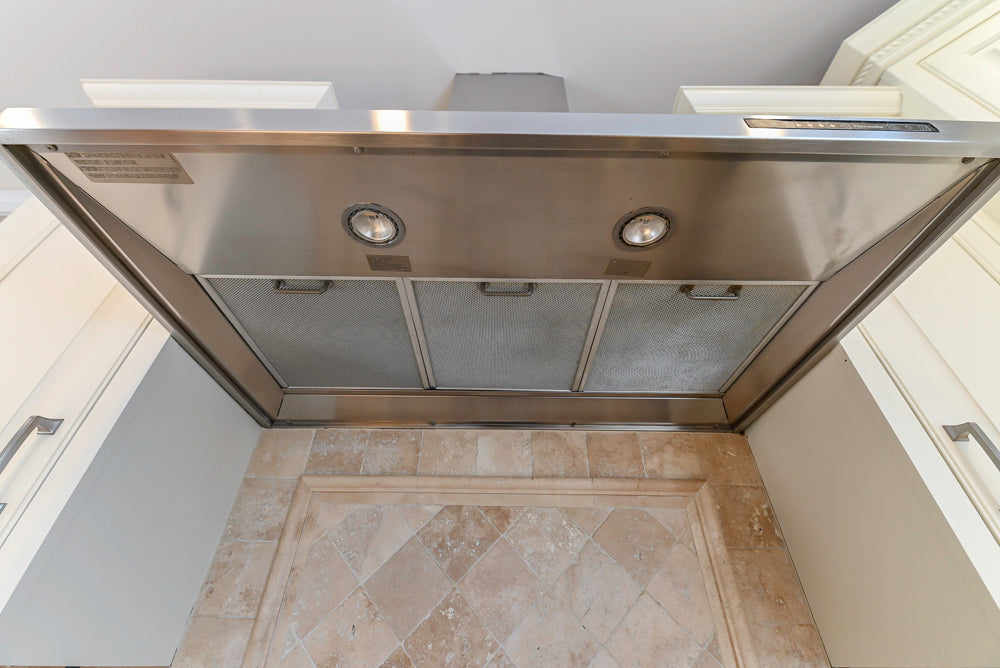 Traditional Light Cream Kitchen with Island, Granite Countertops and Appliances