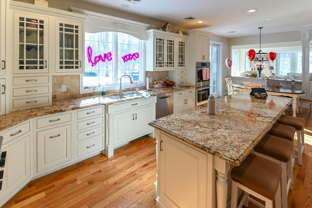 Traditional Light Cream Kitchen with Island, Granite Countertops and Appliances