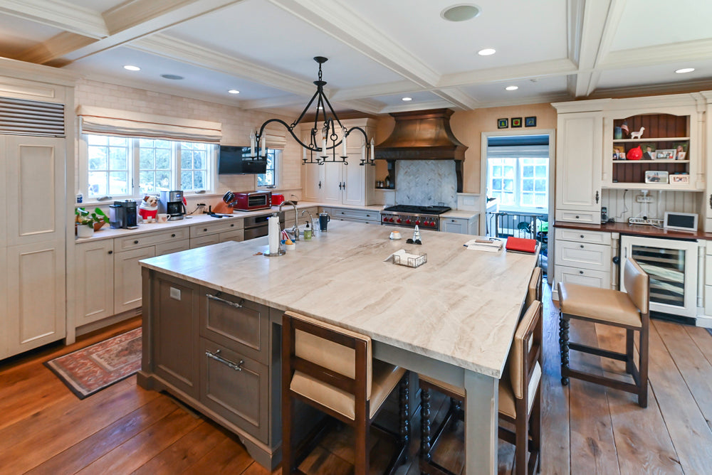 Wood-Mode Traditional Light Cream Kitchen with Marble Countertops and Wolf Range