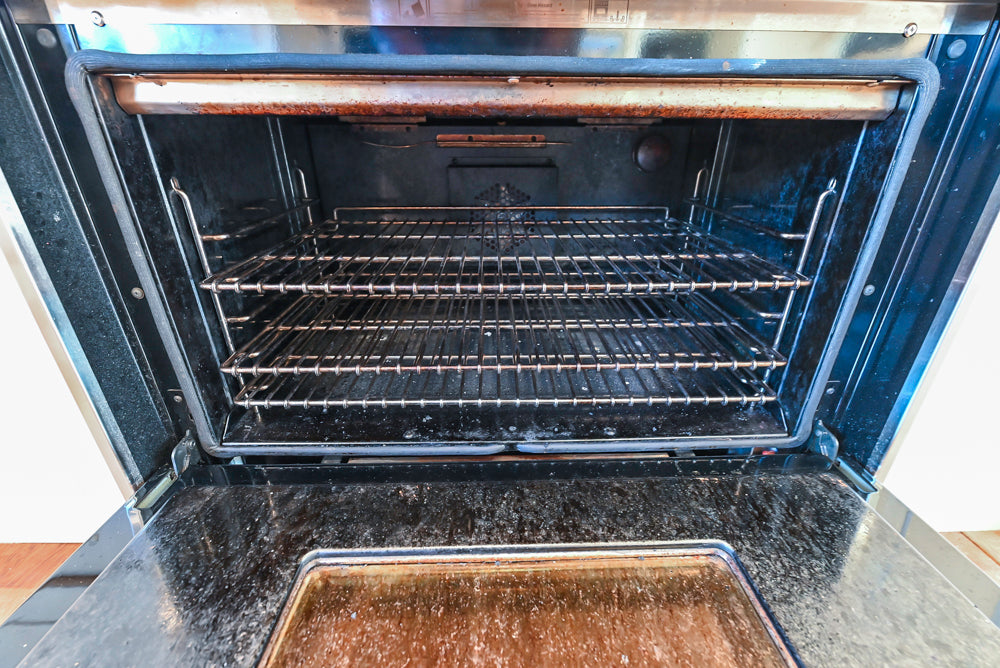 Wood-Mode Traditional Light Cream Kitchen with Marble Countertops and Wolf Range