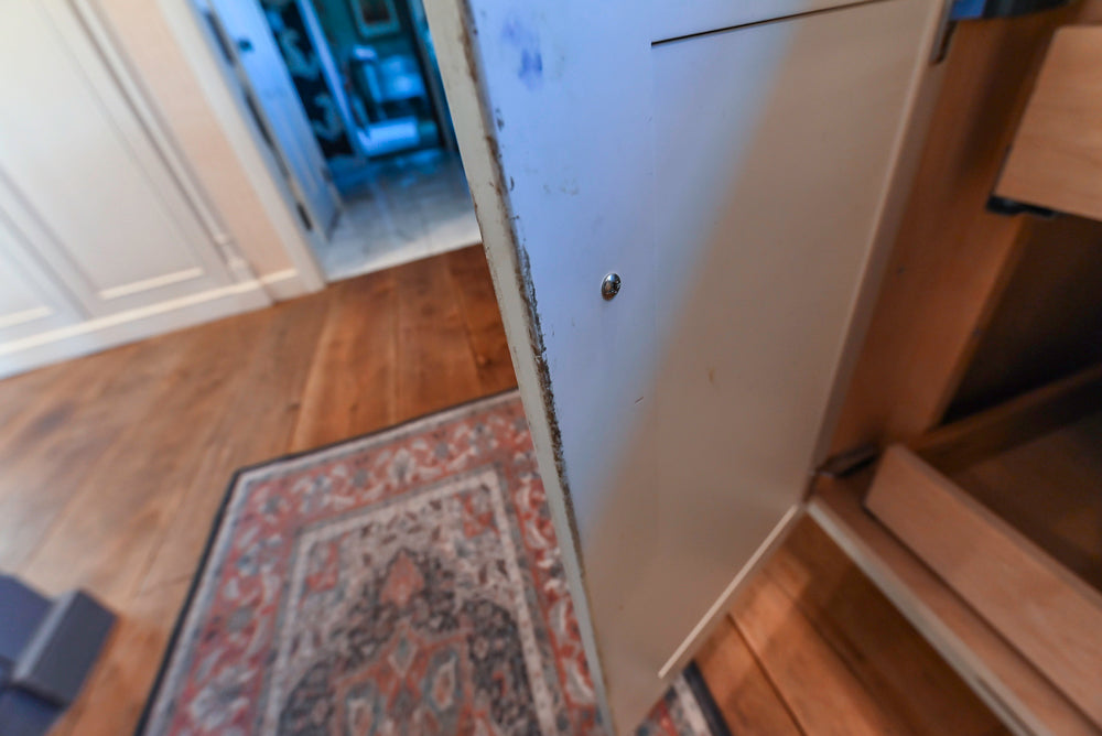 Wood-Mode Traditional Light Cream Kitchen with Marble Countertops and Wolf Range